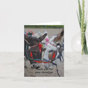 Les ânes à la carte de don en bord de mer