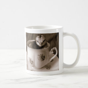 Les Bottes Dans Une Tasse De Thé