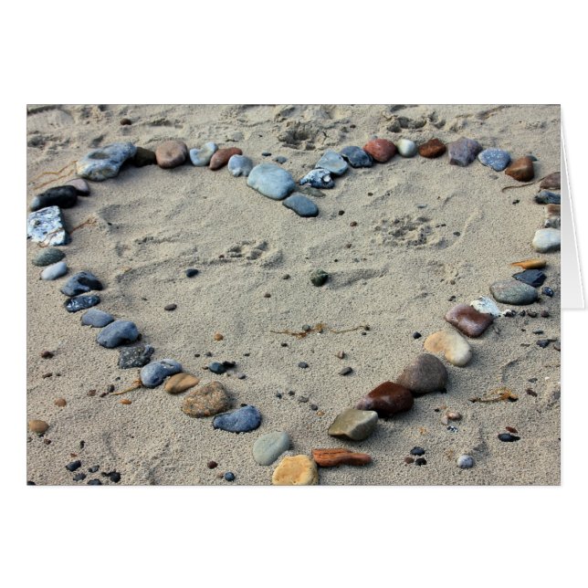 Les cailloux du coeur dans le sable (Devant Horizontal)