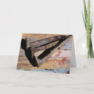 Les clous de la carte de voeux crucifiée du Christ