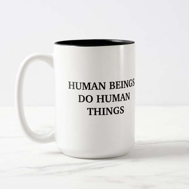 Les êtres humains font les choses humaines Mug (Gauche)