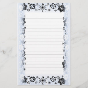 Les flocons de neige encadrent le papier à lettre