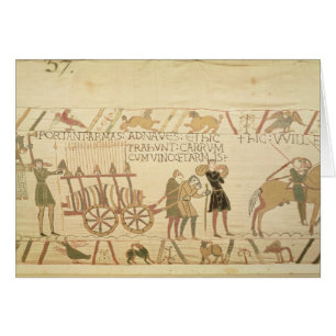 Les hommes tirant un chariot ont chargé avec du