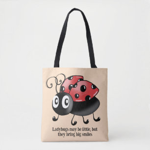 Les Ladybugs vivants sur le Sac fourre-tout rouge