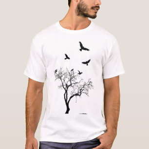 Les oiseaux volent du T-shirt utilisé et déchir