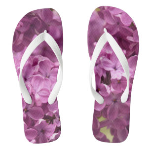 Les tongs des fleurs de Lilacs