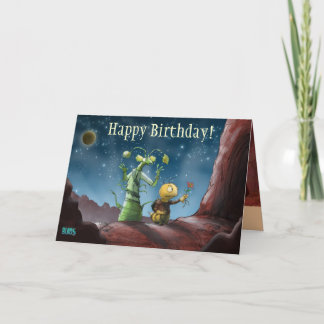 L'espace branche la carte d'anniversaire sur table