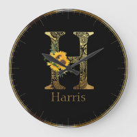 Lettre noire et or H Tournesols ronds Horloge