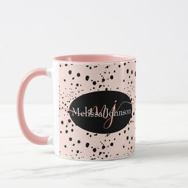 Lettres élégantes en or rose sur mug noir (Gauche)
