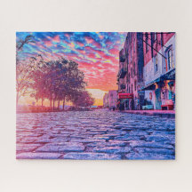 Lever de soleil vif sur la rue River Puzzle