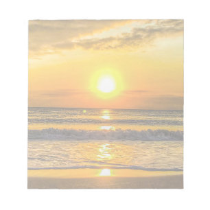 Lever du soleil sur le Bloc-notes de plage