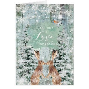 Lièvres de neige d'hiver de Noël une carte d'amo