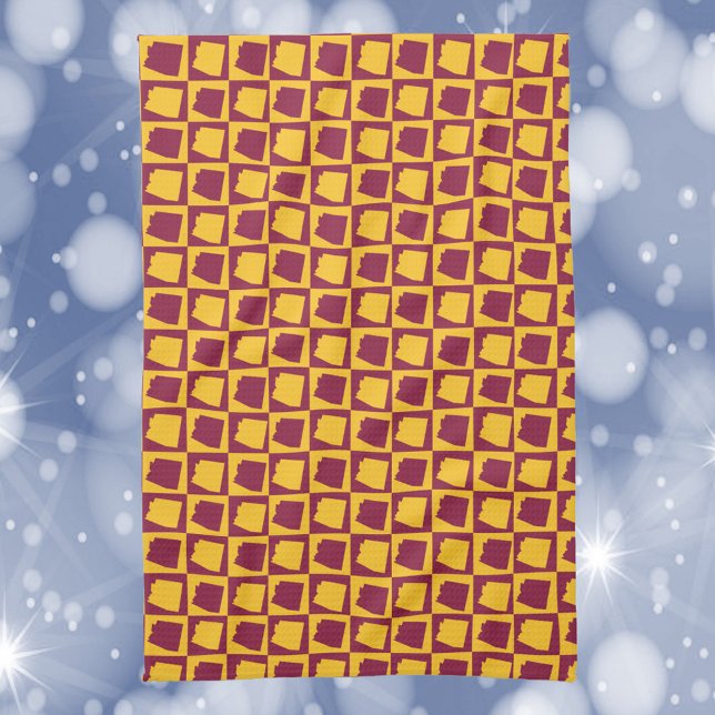 Linge De Cuisine Arizona Geometric Maroon and Gold Pattern (A kitchen towel with a maroon and gold pattern featuring the US state of Arizona)