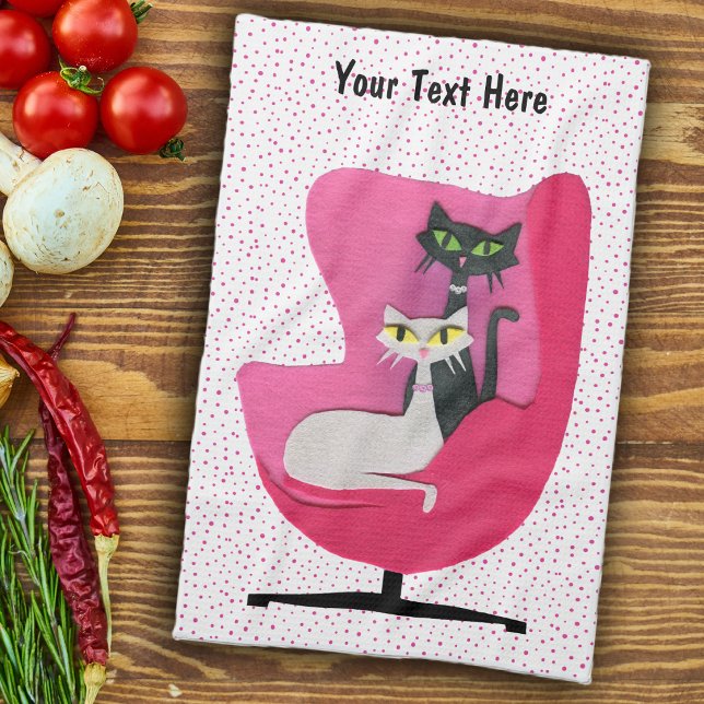 Linge De Cuisine Chats atomiques mignons dans des points de chaise  (Mid century style cats in pink chair on white with pink polka dots kitchen hand towel.)