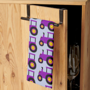 Linge De Cuisine Conception de tracteur violet sur fond de couleur