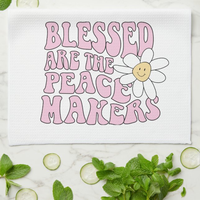 Linge De Cuisine Daisy et les artisans de la paix Slogan (Plié)