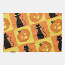 Jack-o’-lantern and cat kitchen towel.
