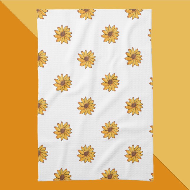 Linge De Cuisine Marqueur Motif jaune Fleur (A kitchen towel with a pattern of hand drawn yellow sunflowers.)