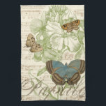 Linge De Cuisine Papillons sur Partition avec Design Floral<br><div class="desc">Un design floral vert et de la partition font arrière - plan à un trio de papillons dans cette pièce de Vision Studio. Le mot français papillon est également emblaqué au fond de la pièce. Si vous aimez les papillons, la nature, ou tout comme vous entourer de beauté, c'est l'impression...</div>