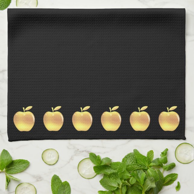 Linge De Cuisine Pommes dorées élégantes sur fond noir (Plié)