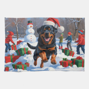 Linge De Cuisine Rottweiler courant dans la neige avec un chapeau d