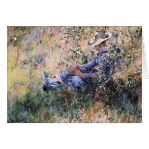 Lire sous la Hawthorne en fleurs Bush