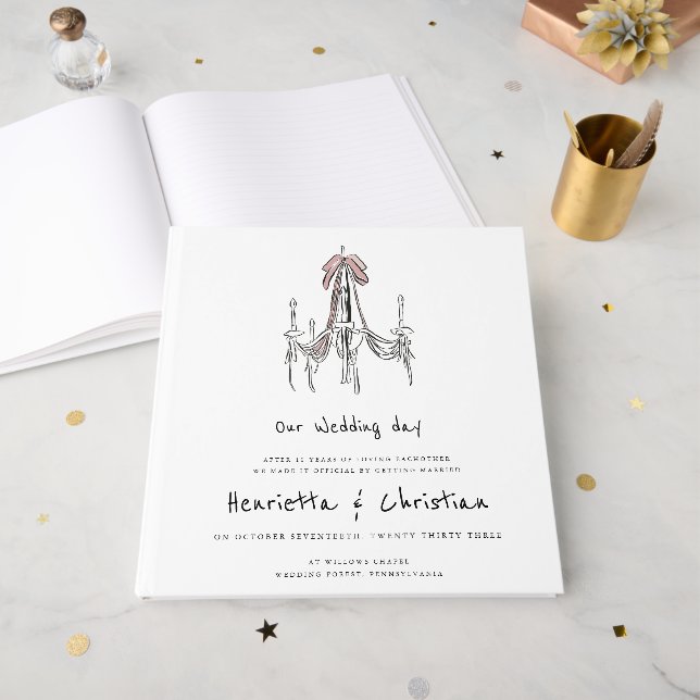 Livre d'or de mariage chic avec écriture et lustre (Recto ouvert)