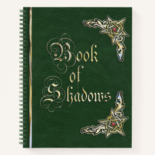 Livre vert et or des ombres