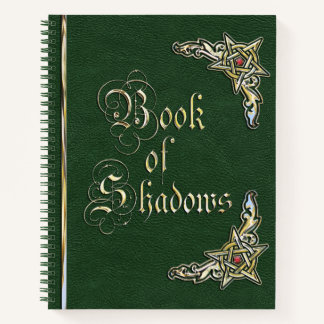 Livre vert et or des ombres