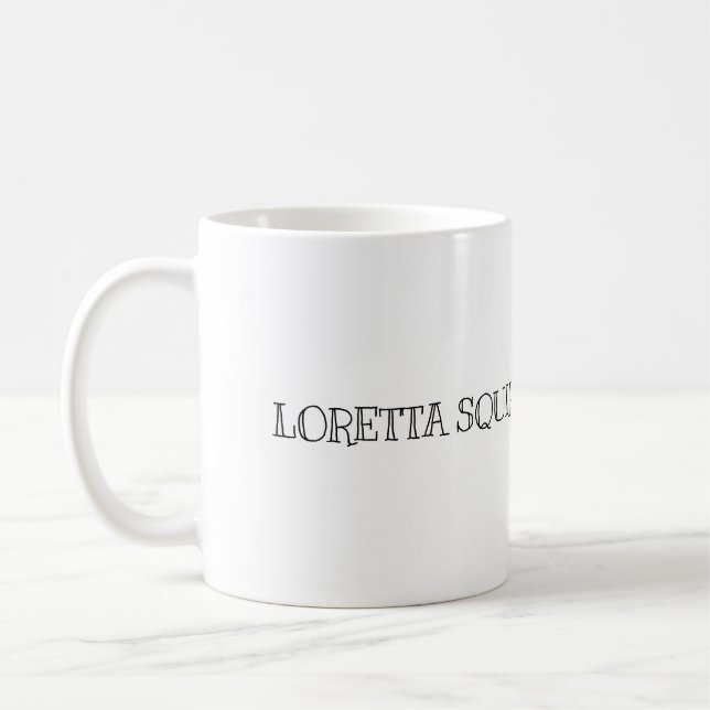Loretta accumule la tasse (Gauche)