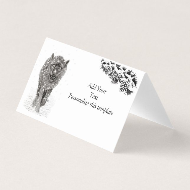 Loup noir en colère dans la neige, hiver sauvage (Front)