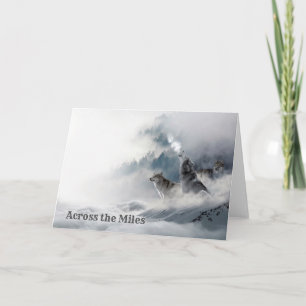 Loups hurler dans la carte de voeux d'hiver