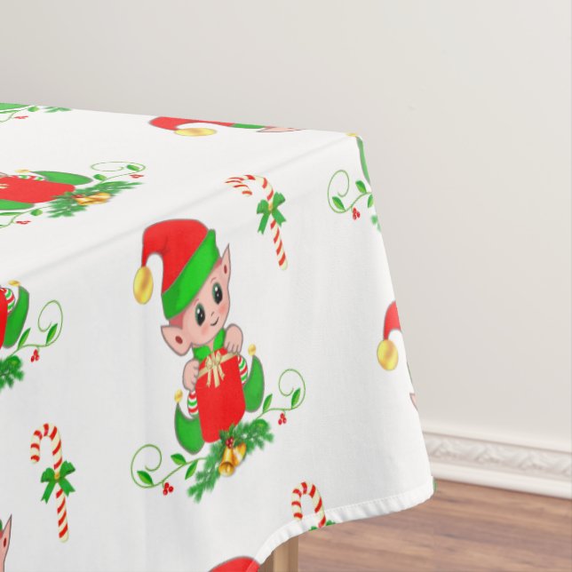 Lutin de Noël et canne à sucre sur nappe blanche (In Situ)