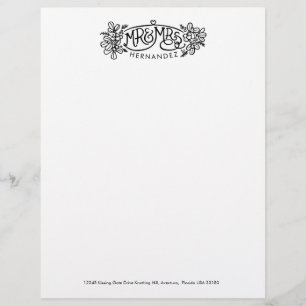 M. & Mme mistletoe dessinant une nouvelle lettre d