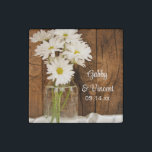 Magnet En Pierre Mason Jar et White Daisies Country Barn Mariage<br><div class="desc">Customisez ces charmants Mason Jar et White Daisies Country Mariage Stone Magnets avec le nom personnel de la mariée et du marié et la date spécifique de la cérémonie de mariage. Ces magnets mariages rustiques et chic de ranch à la mode personnalisée sont décorés d'une photo fleurie d'un charmant pot...</div>
