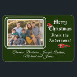 Magnet Flexible Carte de Noël<br><div class="desc">Carte de Noël Photo Magnet design présente votre photo dans le coin supérieur gauche contre un arrière - plan vert profond. Photo encadrée par une belle bordure verte et blanche. En-tête personnalisable : "Joyeux Noël" en lettres blanches. Image d'un chapeau de Père Noël équilibré au-dessus du "C". Le texte ci-dessous...</div>