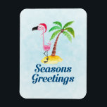 Magnet Flexible Flamant rose rose Joyeuses Fêtes à Santa Hat<br><div class="desc">Festive fêtes flex-aimant avec le texte : Joyeuses Fêtes. Dessin fantaisiste d'un flamant rose portant un chapeau de santa rouge. Posé sur un monticule de sable de plage jaune avec à l'arrière un cocotier vert et marron. Arrière - plan bleu clair. Design tropical sympa et festif.</div>
