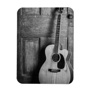 Magnet Flexible Guitar Leaning Against Door in Black and White