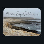 Magnet Flexible Morro Bay California Ocean Cliffs Photography<br><div class="desc">A foggy overcast day in Morro Bay California with the ocean waves hitting the rocks on the shore in this beach photograph souvenir. This seaside travel photo keepsake magnet gift features black cursive script above the beach rocks and grey sky.</div>