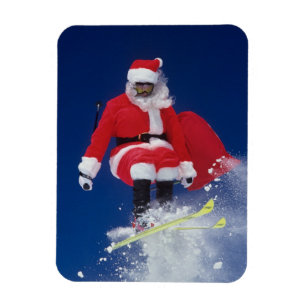 Magnet Flexible Père Noël en skis sautant d'une corniche à