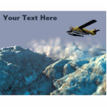 Magnet Photo Sculpture Avant La Tempête<br><div class="desc">Un tableau numérique d'un Otter DHC-3 de Havilland, opéré par le mythique Flying Moose Aviation de Talkeetna, en Alaska, survolant une chaîne de montagnes enneigée. Le bord avant d'une tempête de neige qui s'approche peut être vu en montant au-dessus des montagnes dans l'arrière - plan proche. Ajoutez votre propre texte....</div>
