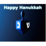Magnet Photo Sculpture Chanukkah Dreidel bleu brillant<br><div class="desc">Un rêve moderniste,  métallique,  bleu contre un arrière - plan sombre et nocturne. Deux des lettres hébraïques trouvées sur un dreidel,  une nonne et un shin,  brillent brillamment. Le texte "Happy Hanoukka" apparaît également en bleu et blanc brillant.</div>