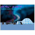 Magnet Photo Sculpture Far North Christmas - Kuvianak Innovia<br><div class="desc">Un tableau numérique représentant un igloo sur la calotte glaciaire polaire, des chiens de traîneau et un homme dans un parka. Les aurores boréales brillent au-dessus. Kuvianak Innovia est Joyeux Noël en inuktitut (Eskimo). Au-dessus du texte anglais Kuvianak Innovia apparaît dans l'alphabet inuktitut. Les Inuit sont communément appelés Eskimo, mais...</div>