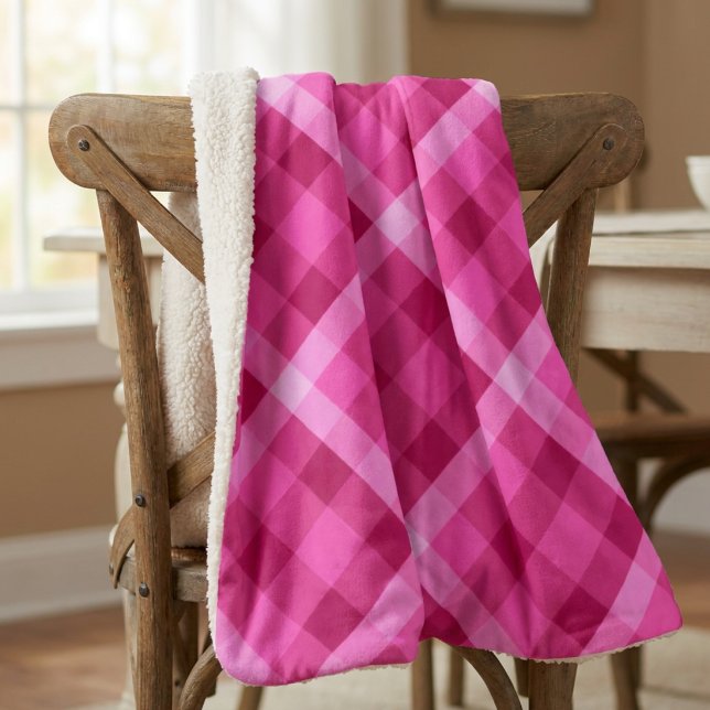Magnifique plaid rose magenta petite couverture sh (Beautiful Pink Magenta Plaid Small Sherpa Blanket draped on the back of a chair in dining room.)