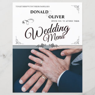 Mains d'un couple gay de mariage avec des anneaux