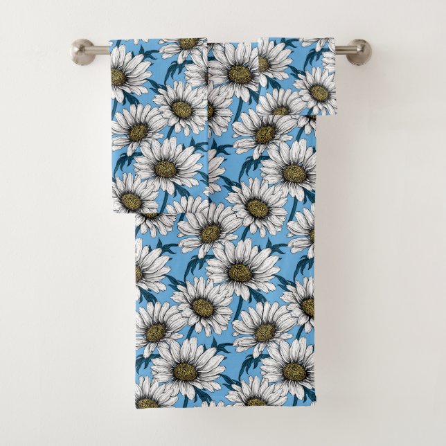 Maisonnettes, fleurs sauvages sur bleu (En situation)