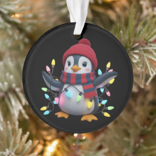 Manchot des lumières de Noël portant un chapeau de