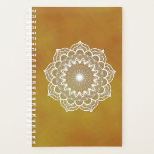 Mandala blanc sur fond doré