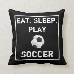 Mangez le coussin noir et blanc du football de jeu