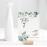 Mariage blanc moderne Carte Numéro de table<br><div class="desc">Ce design moderne de carte de numéro de table mariage blanc verdoyant propose un mélange facile et des styles coordonnés en noir et blanc avec des éléments de verdure délicats ajoutant une floraison gracieuse autour d'une simple typographie sophistiquée et un joli script de calligraphie minimale. L'eucalyptus à l'aquarelle et d'autres...</div>